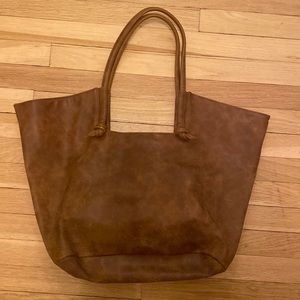 Anthropologie leather purse with knot detail